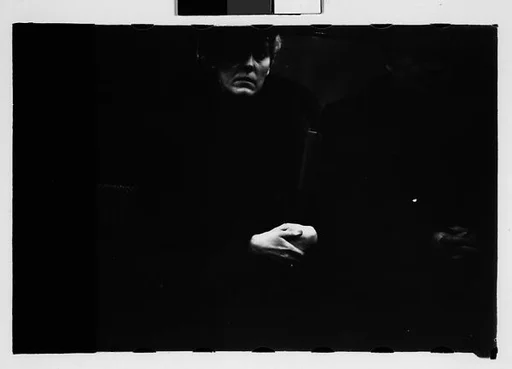 [Five 35mm Film Frames: Subway Passengers, New York City: Woman, Man in Hat and Overcoat]