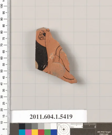 Terracotta fragment of a kylix (drinking cup)