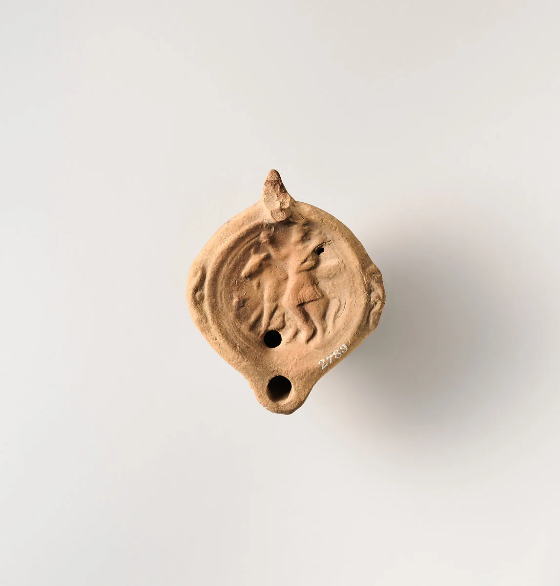 Terracotta oil lamp — Unknown