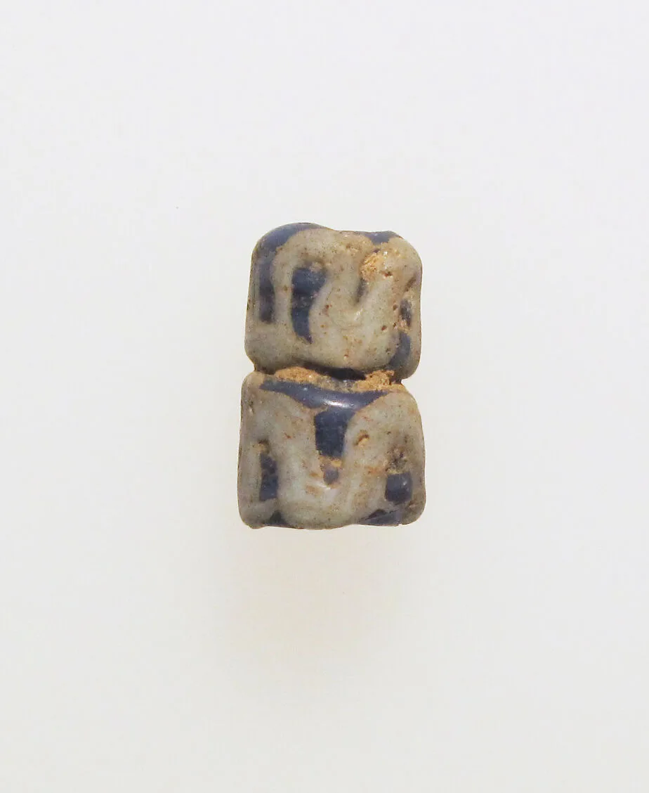Glass double bead — Unknown