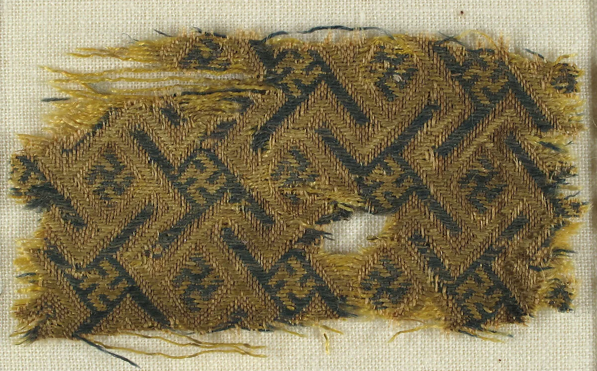 Textile with Interlacing Bands forming Swastika Figures — Unknown