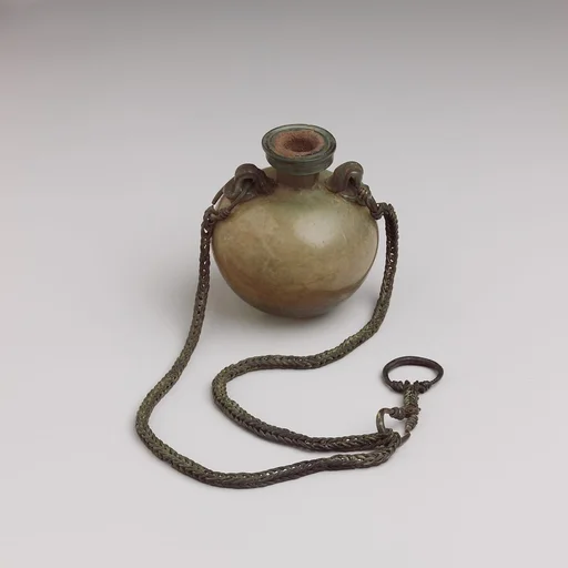 Glass aryballus (oil bottle) with bronze suspension chain