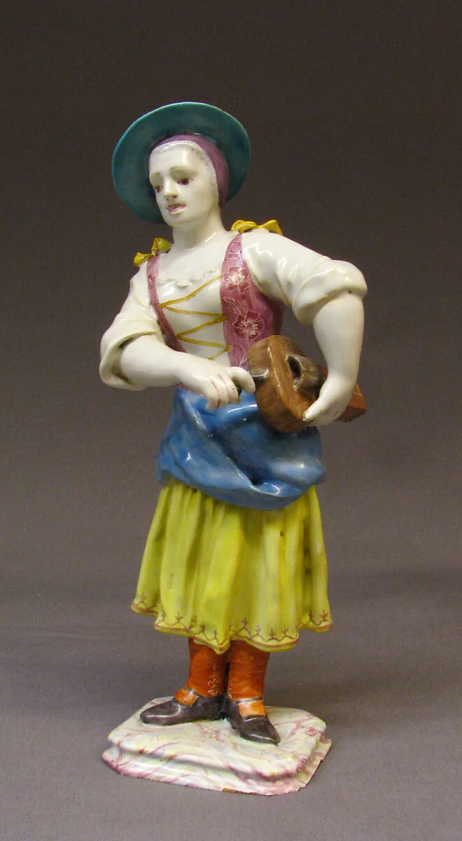 Girl cranking a hurdy-gurdy — Johannes Zeschinger