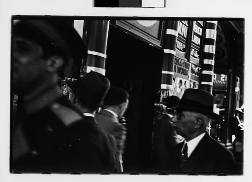 [Two 35mm Film Frames: Outside Movie Theater Ticket Window, New York City]