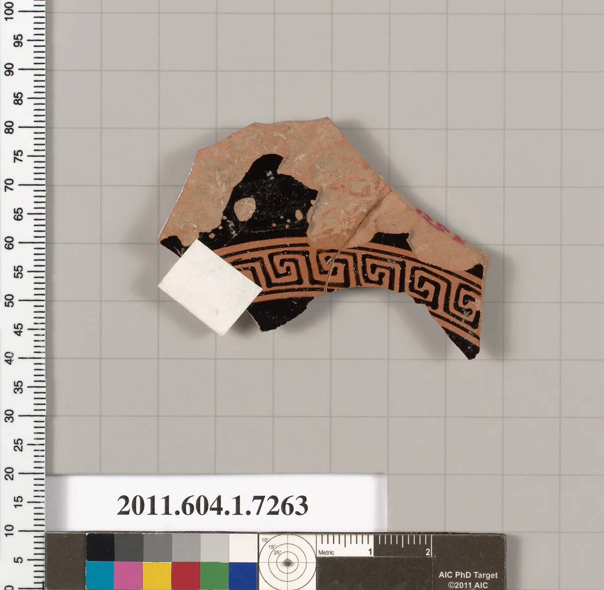 Terracotta fragment of a kylix (drinking cup) — Makron