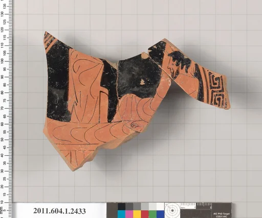 Terracotta fragment of a kylix (drinking cup)