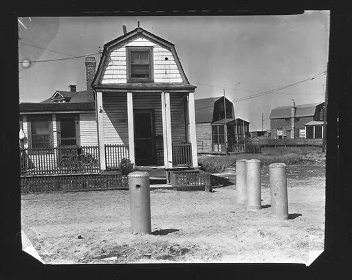[Clapboard Beach House with Pilings in Driveway, Posssibly Canarsie, Brooklyn, New York?]