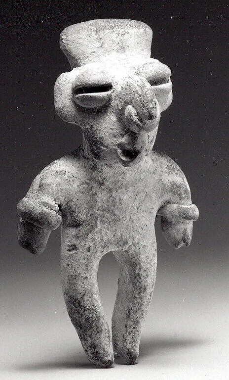 Standing Figure — Unknown