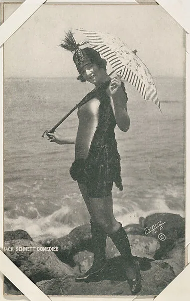 Bathing beauty with fancy hat and parasol from Mack Sennett Comedies Arcade series (W423) — Unknown