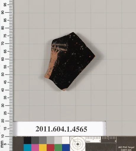 Terracotta fragment of a kylix (drinking cup)
