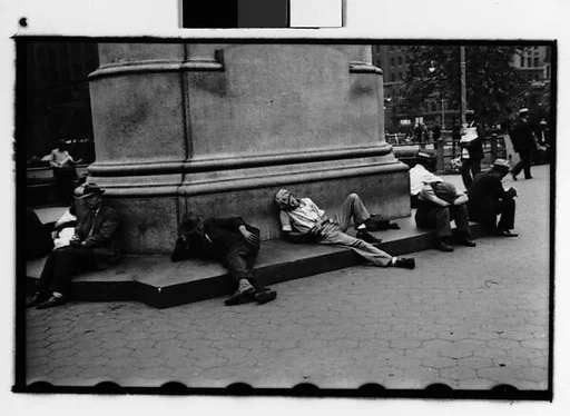 [Two 35mm Film Frames: Men Lying Around Statue Base, Union Square Park, New York City]