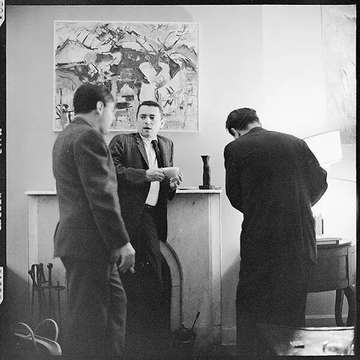 [11 Snapshots of John McDonald and Two Unidentified Men in Conversation]