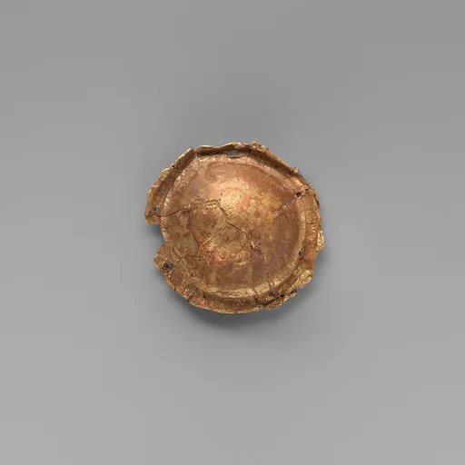 Gold roundel of bulbous form