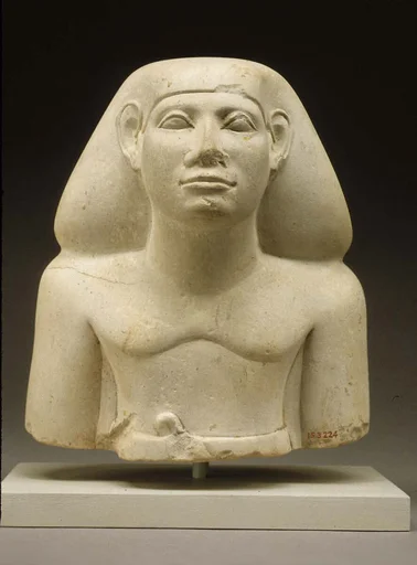 Upper part of male statue