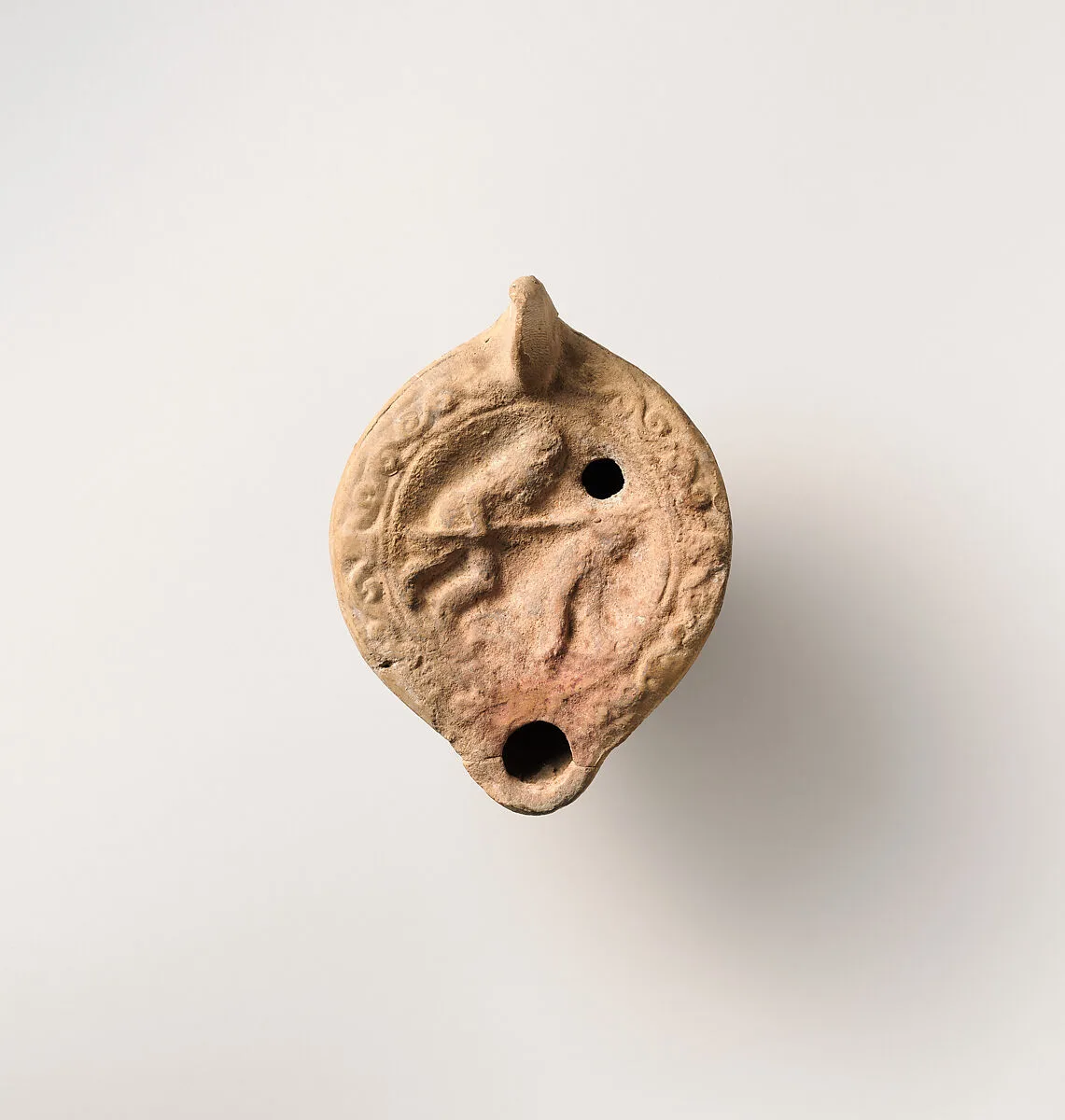 Terracotta oil lamp — Unknown