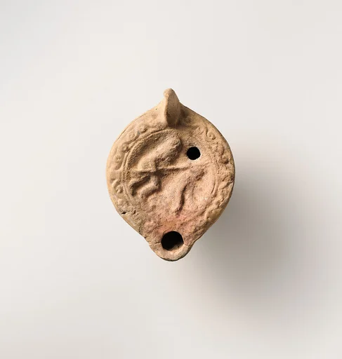 Terracotta oil lamp