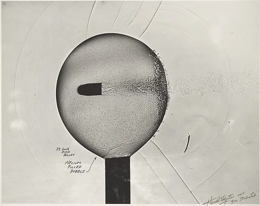 [Bullet Passing Through Helium-Filled Soap Bubble]