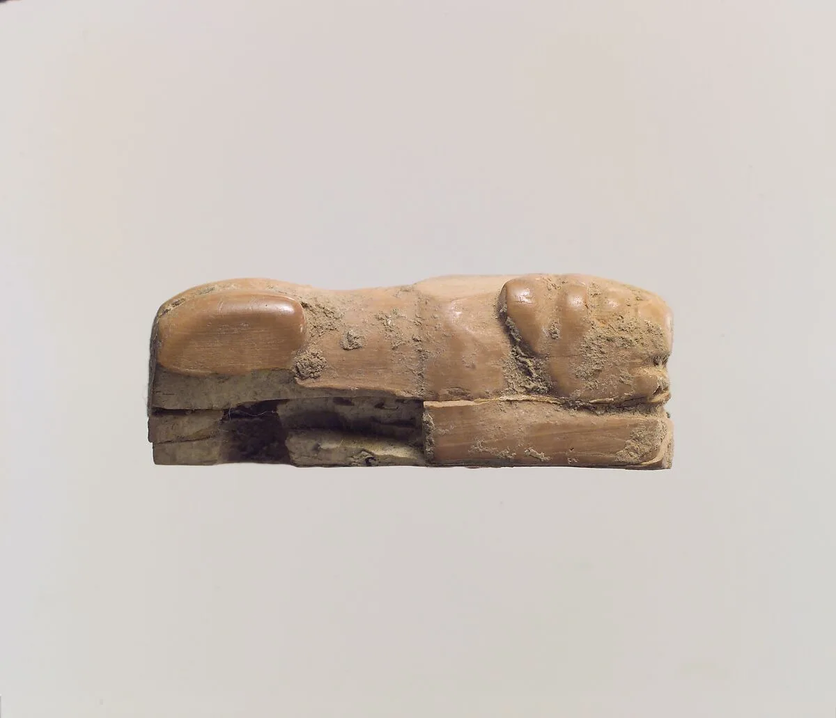 Figure of crouching lion — Unknown