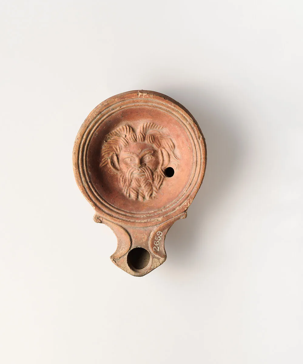 Terracotta oil lamp — Unknown