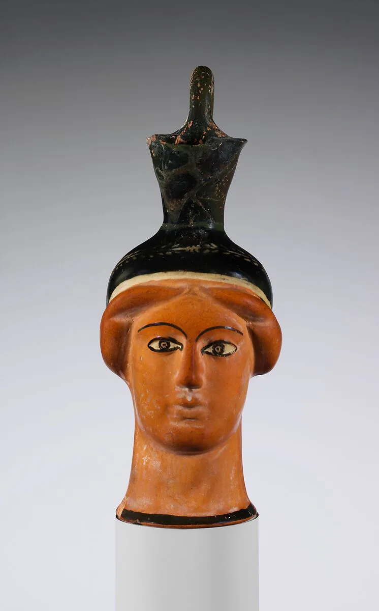 Terracotta oinochoe (jug) in the form of a woman's head — Class S: The Canessa Class of Head Vases