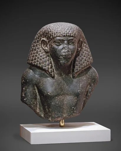 Upper Part of a Statue of a Man