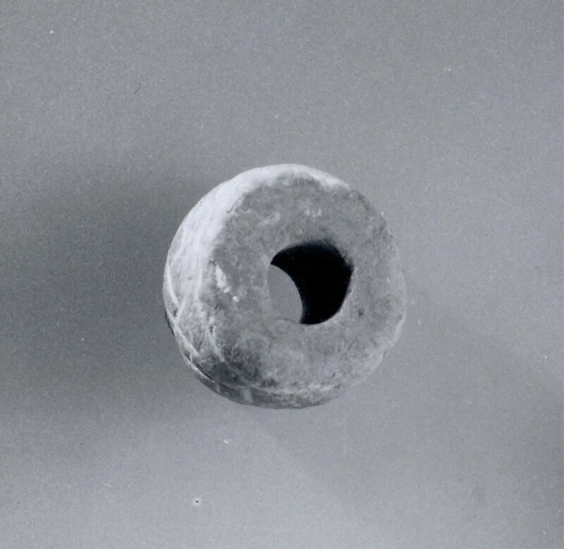 Spindle whorl — Unknown