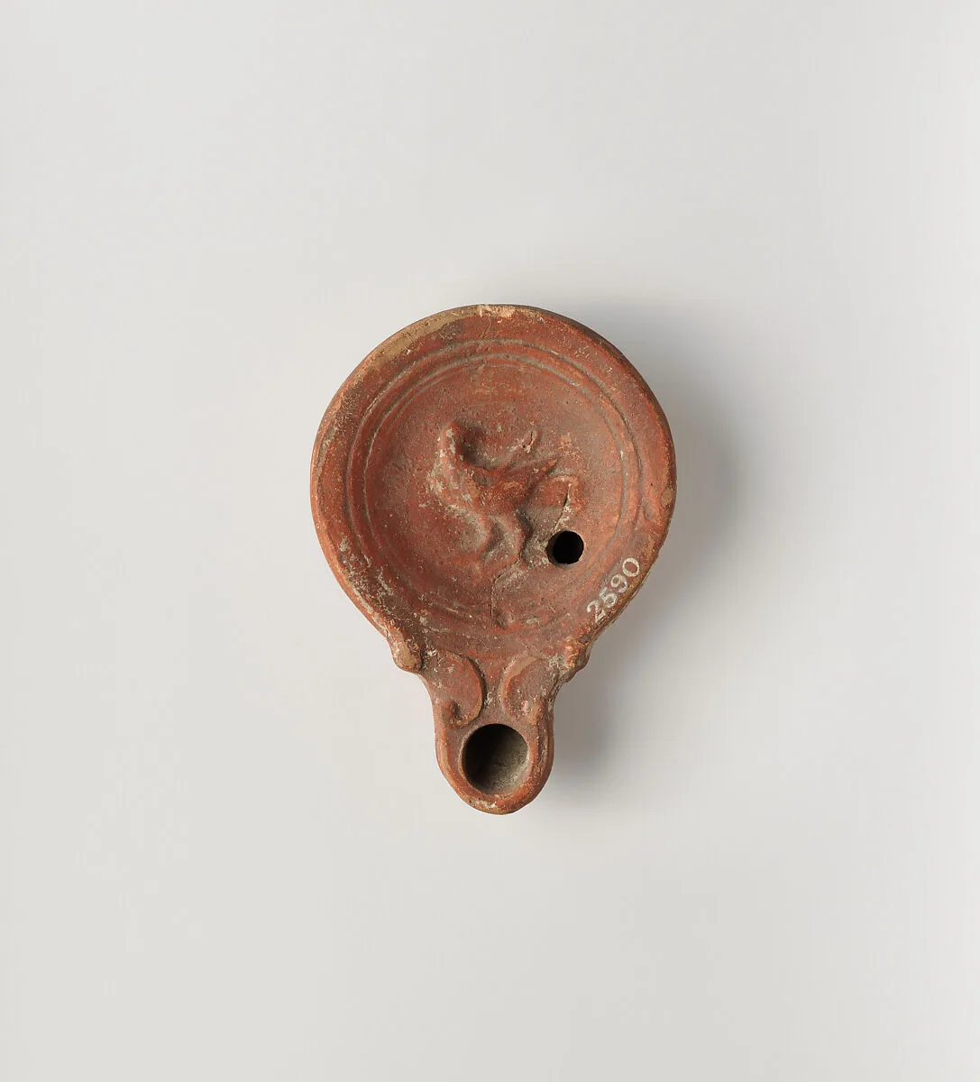 Terracotta oil lamp — Unknown