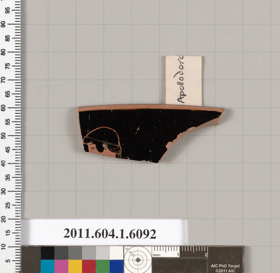 Terracotta rim fragment of a kylix (drinking cup) — Apollodoros