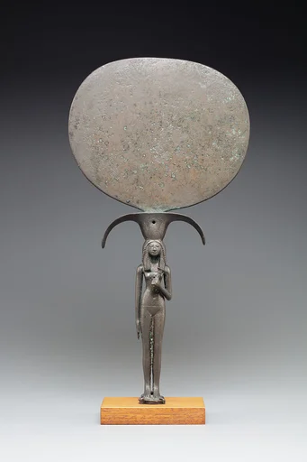 Mirror with a Handle in the Shape of a Young Woman Holding a Papyrus Umbel