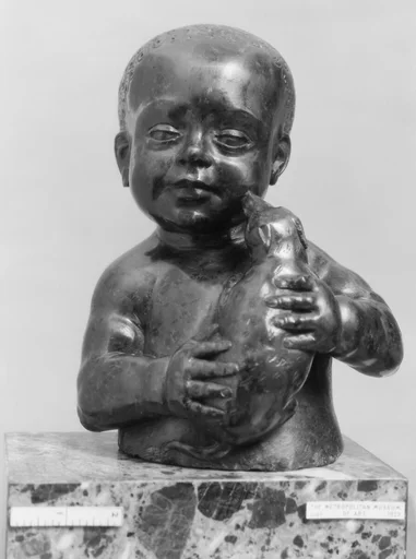 Boy holding a dog