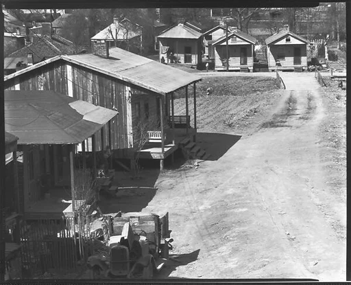 [Wooden Houses and Jalopy by Dirt Road, From Elevated Position, Atlanta, Georgia]