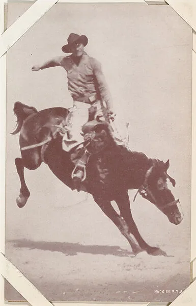 Cowboy riding bucking bronco from Indians and Western Historical Scenes series (W417) — Unknown