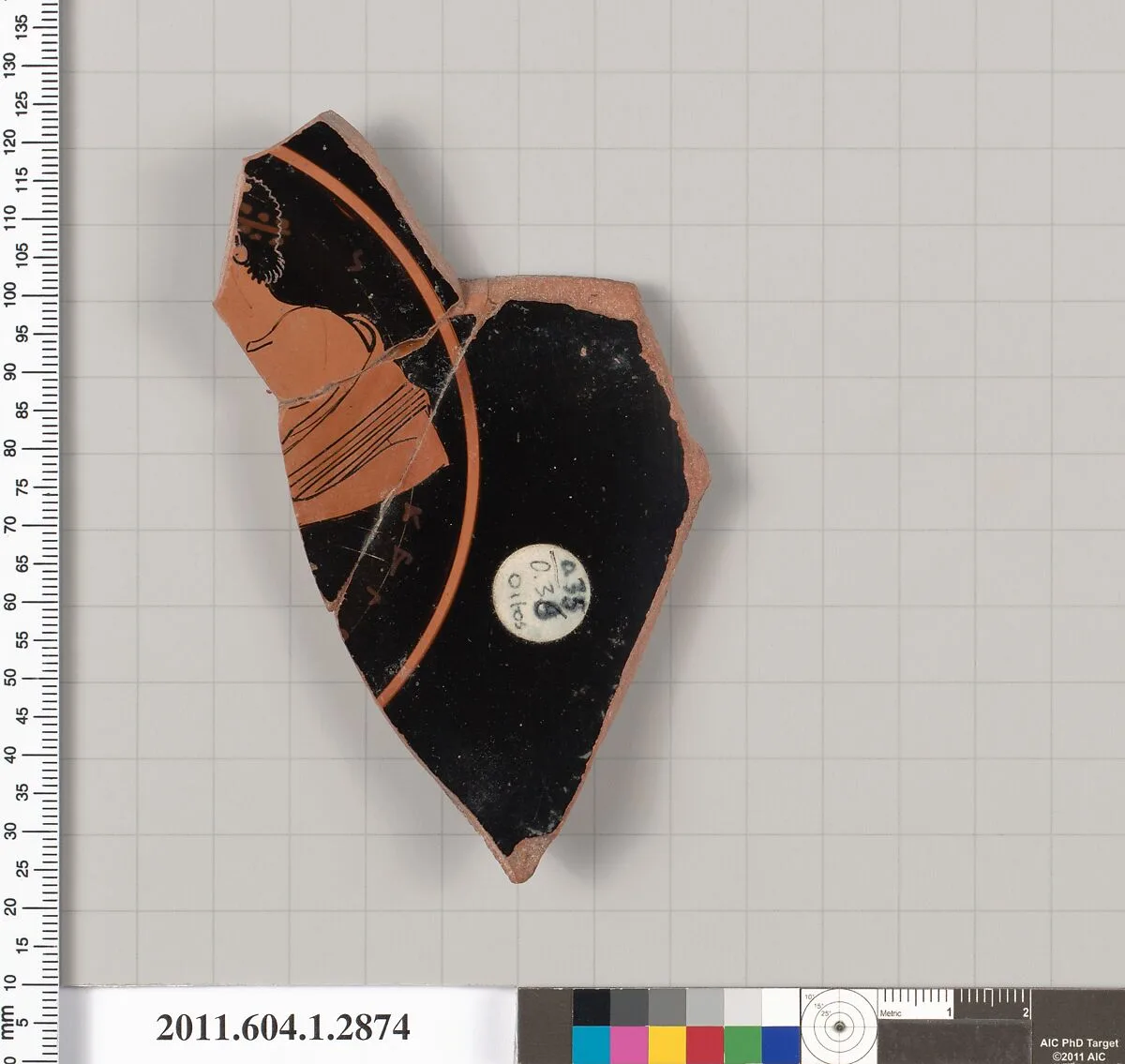 Terracotta fragment of a kylix (drinking cup) — Oltos