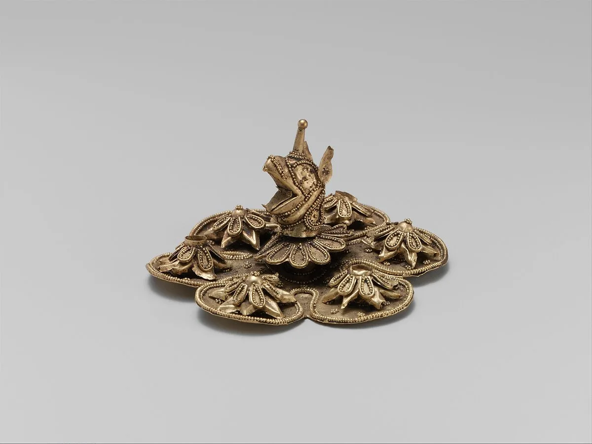 Gold rosette with the head of a griffin — Unknown