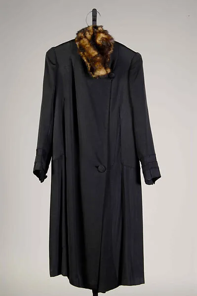 Coat — A. Denova