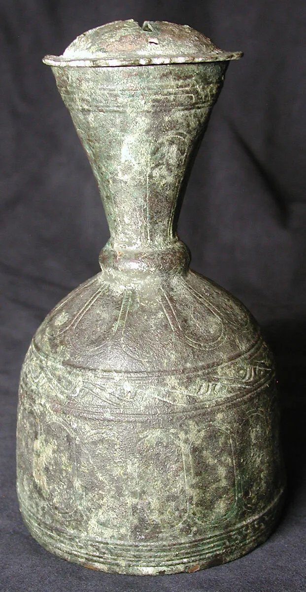 Metal Bottle with Faceted Design — Unknown