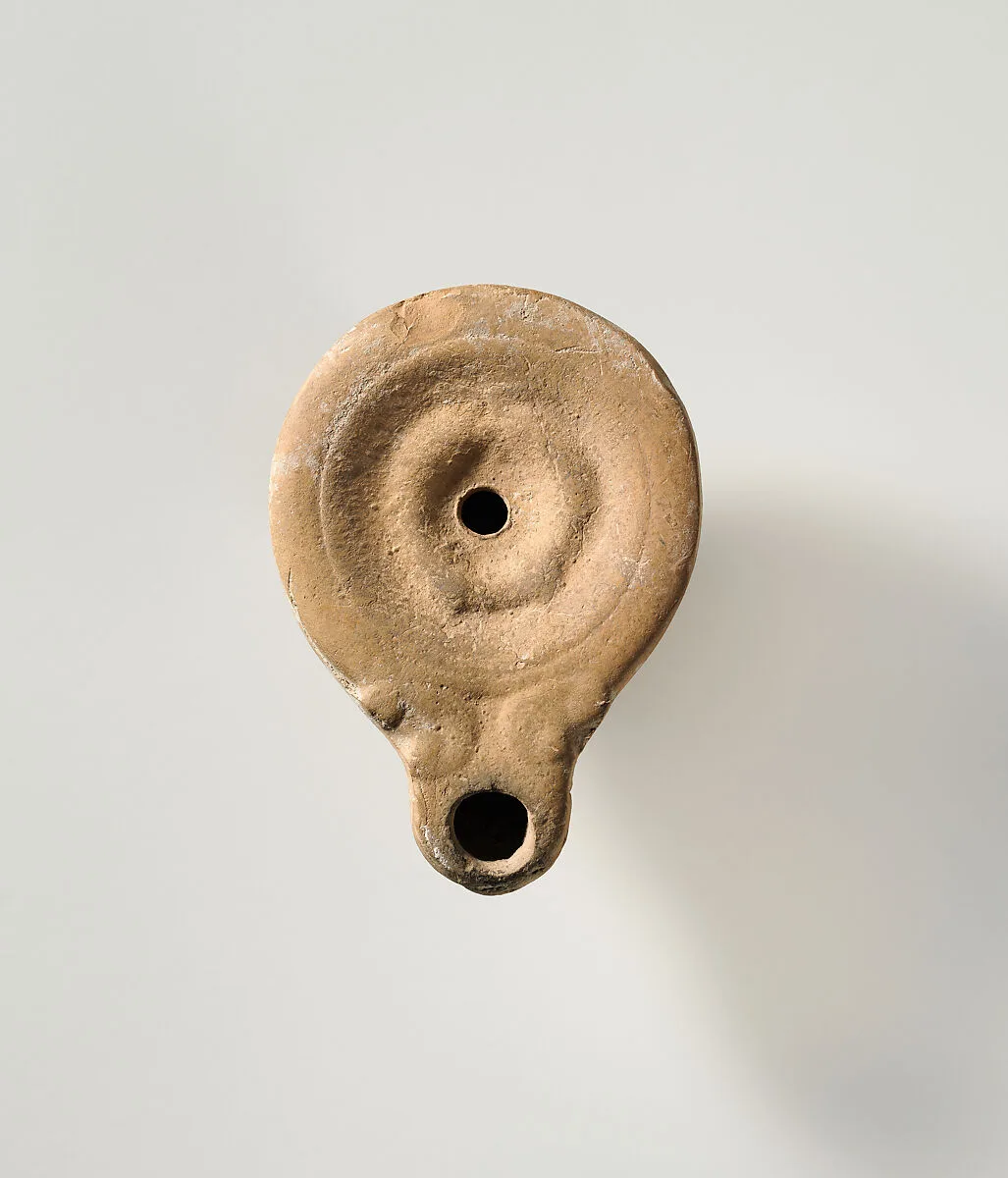 Terracotta oil lamp — Unknown