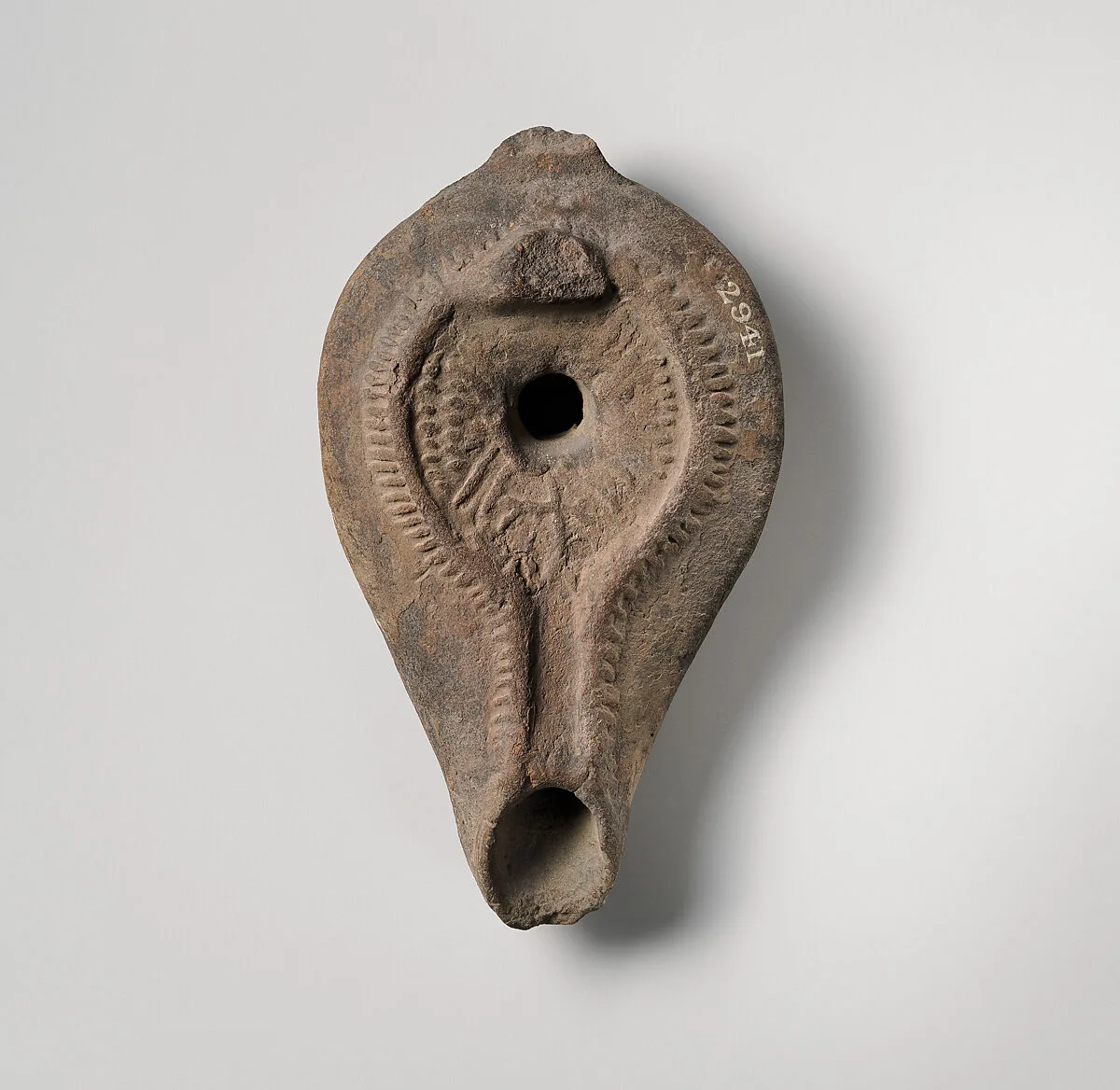 Terracotta oil lamp — Unknown