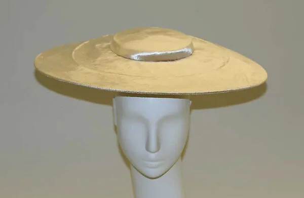 Hat — Mr. John, Inc.