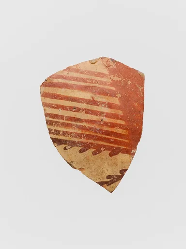 Terracotta vessel fragment with linear motifs