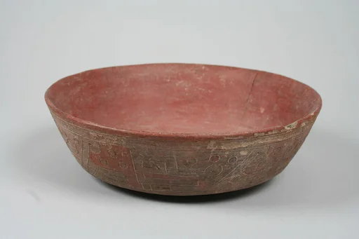 Incised bowl with fox motif