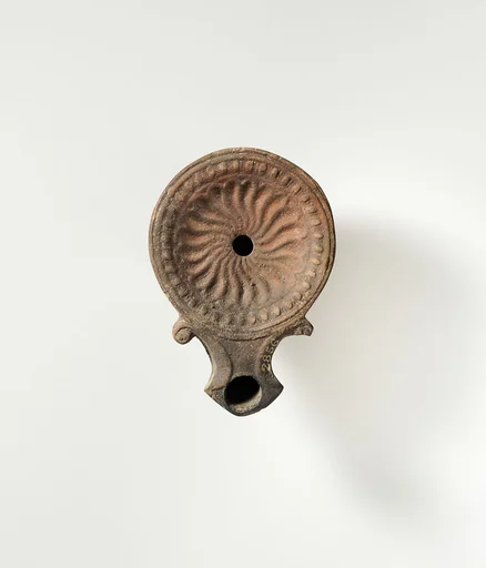 Terracotta oil lamp