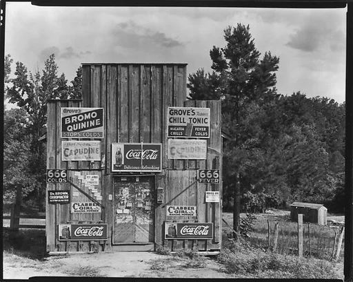 [Roadside Store with Advertisements on Facade, Between Tuscaloosa and Greensboro, Alabama]