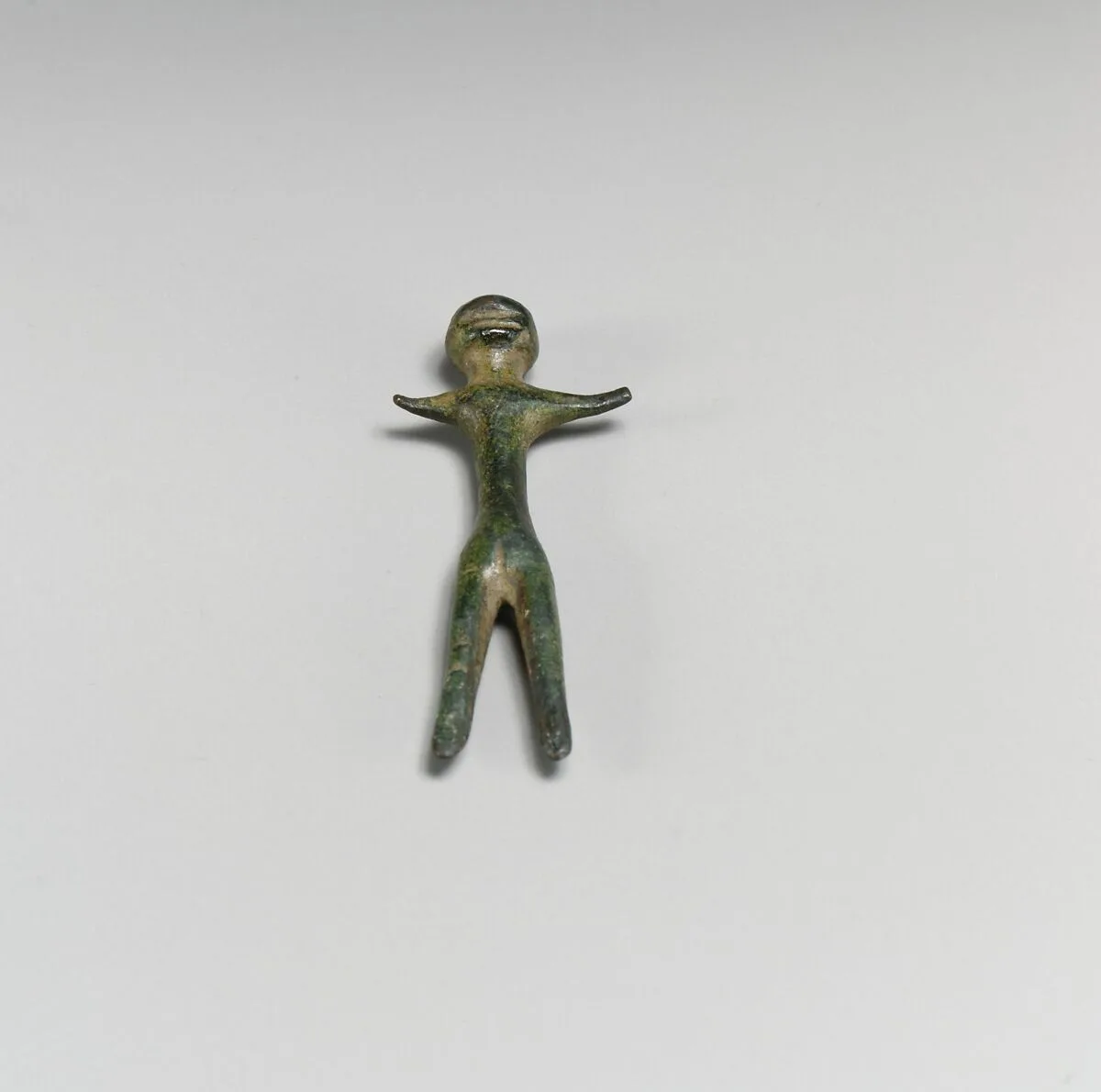 Bronze votive statuette of a standing human — Unknown