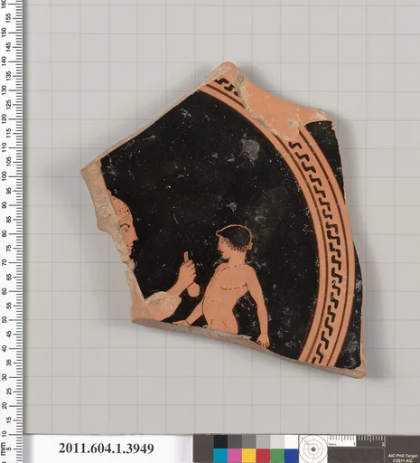 Terracotta fragment of a kylix (drinking cup)
