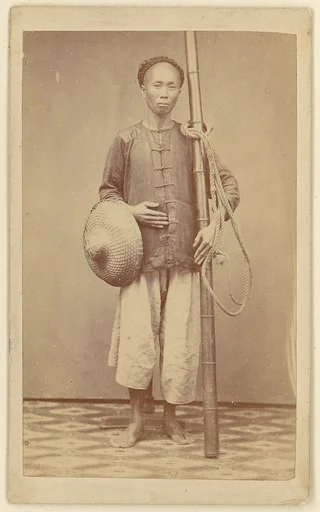 [Man with Bamboo Pole]