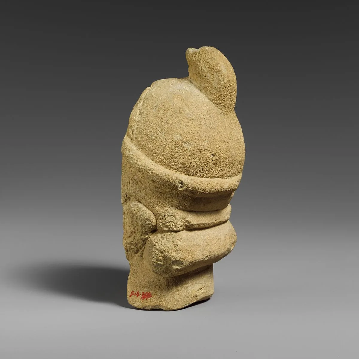 Fragment of a limestone head of the “Triple Geryon” (?) — Unknown