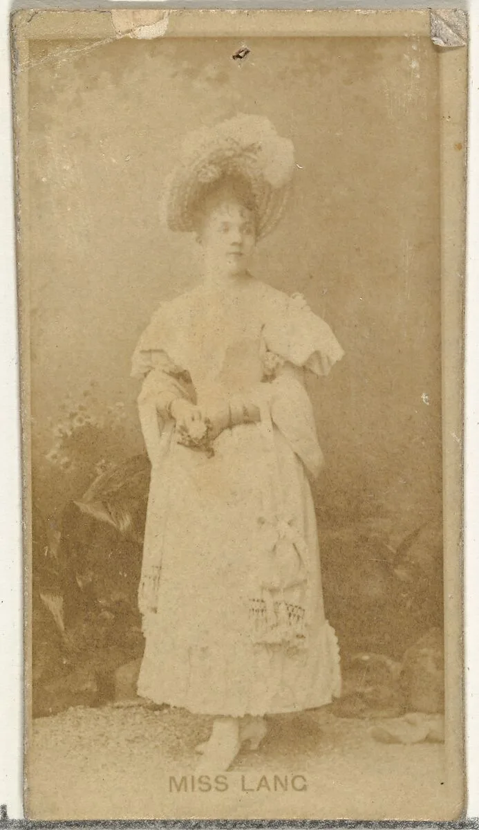 Miss Lang, from the Actors and Actresses series (N145-8) issued by Duke Sons & Co. to promote Duke Cigarettes — American Tobacco Company|W. Duke, Sons & Co.