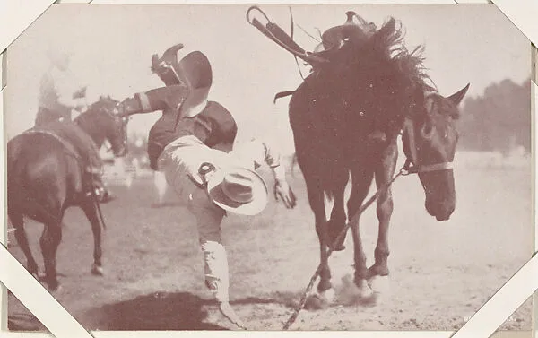 Cowboy falling to ground off bucking bronco from Indians and Western Historical Scenes series (W417) — Unknown