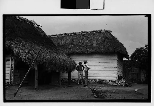 [Farmers in Front of Shanties, Cuba]